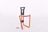 NOS neon orange black speckled water bottle cage